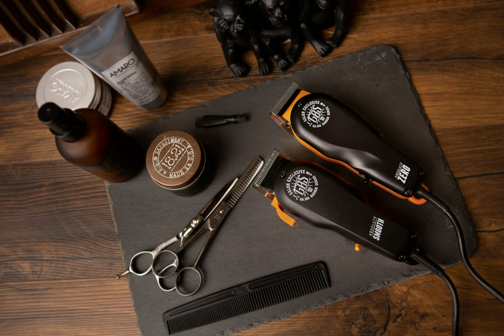 Willy, owner of Willy Cutz barbershop smiling with tools
